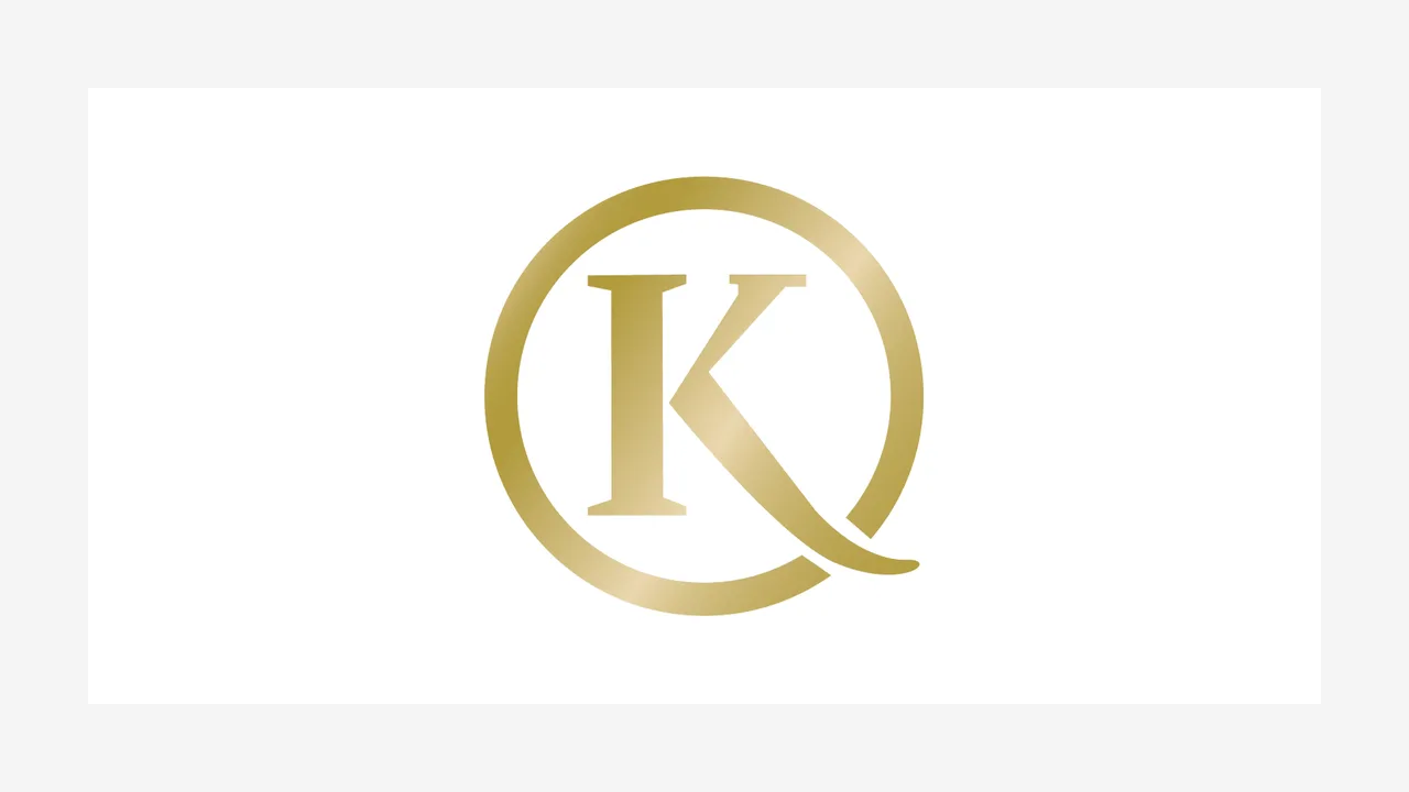 Gold Q and K logo of Qamar Al Kaamil